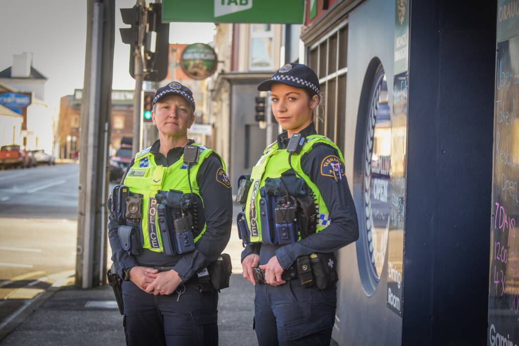 PATROL: Tasmania Police constables Maddison Barron and Anita Rattray will be on the beat at the weekend ensuring patrons, and venues adhere to social distancing measures. Picture: Paul Scambler 