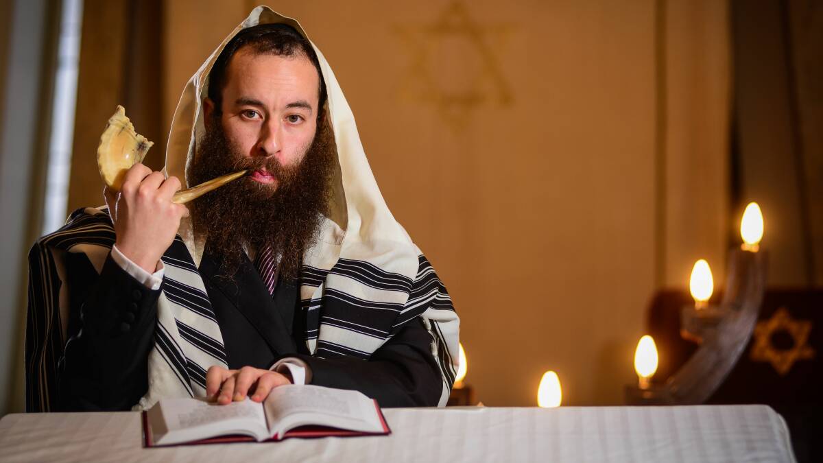 Launceston Rabbi Yochanan Gordon pictured practicing the blowing of shofar. During Rosh Hashanah the taking of photos is forbidden. Picture: File. 
