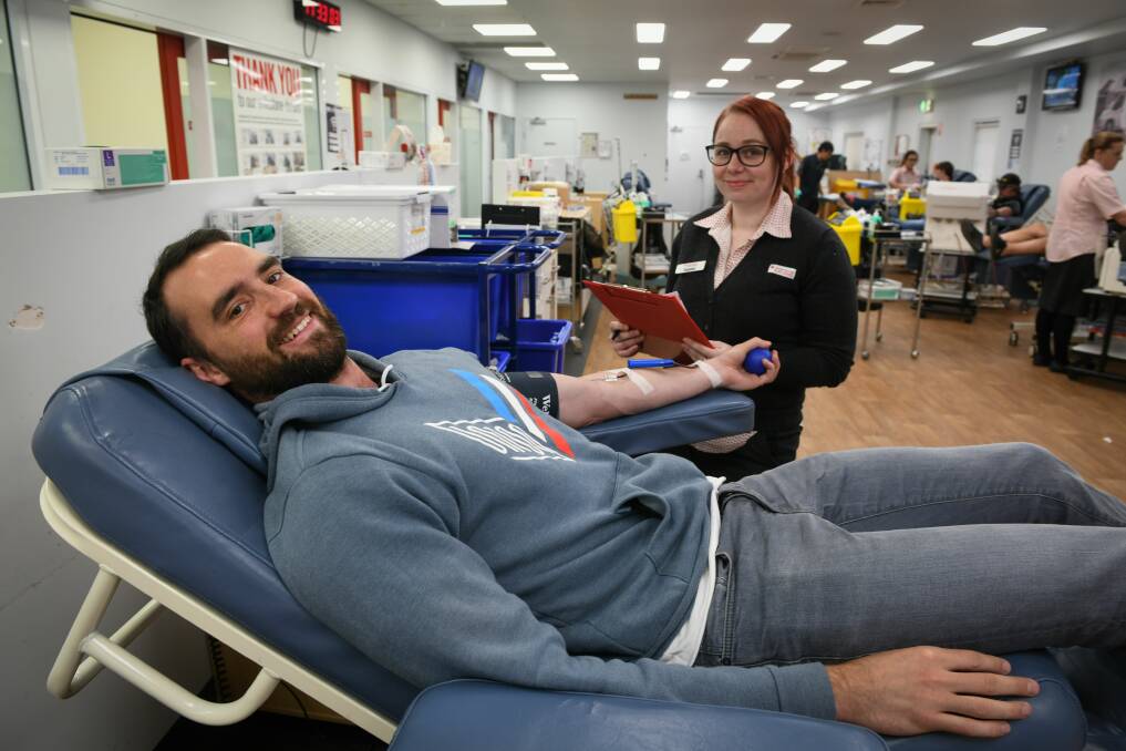 Launceston Donor Centre nurse assitant Sophie Lethborg helps Anthony Johnson of South Launceston donate whole blood. Picture: Paul Scambler 