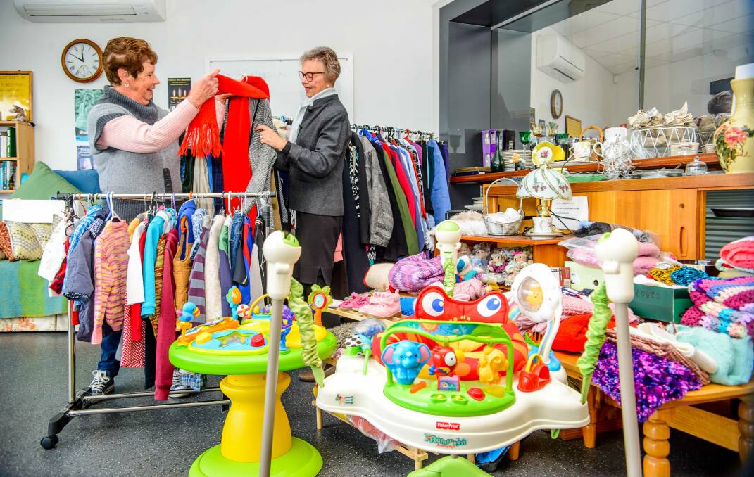 PROUD: Launceston Benevolent Society volunteers Bev Catlin and Jennie Procter, hard at work at the Kings Meadows store. Picture: Scott Gelston