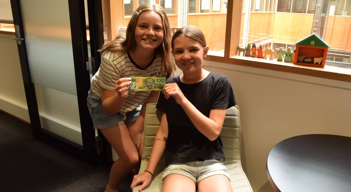 Sweet effort: Molly Crosby, 12, and Olivia Darcey, 12, raised $106 for the Empty Stocking Appeal by selling lemonade. Picture: Jessica Willard 