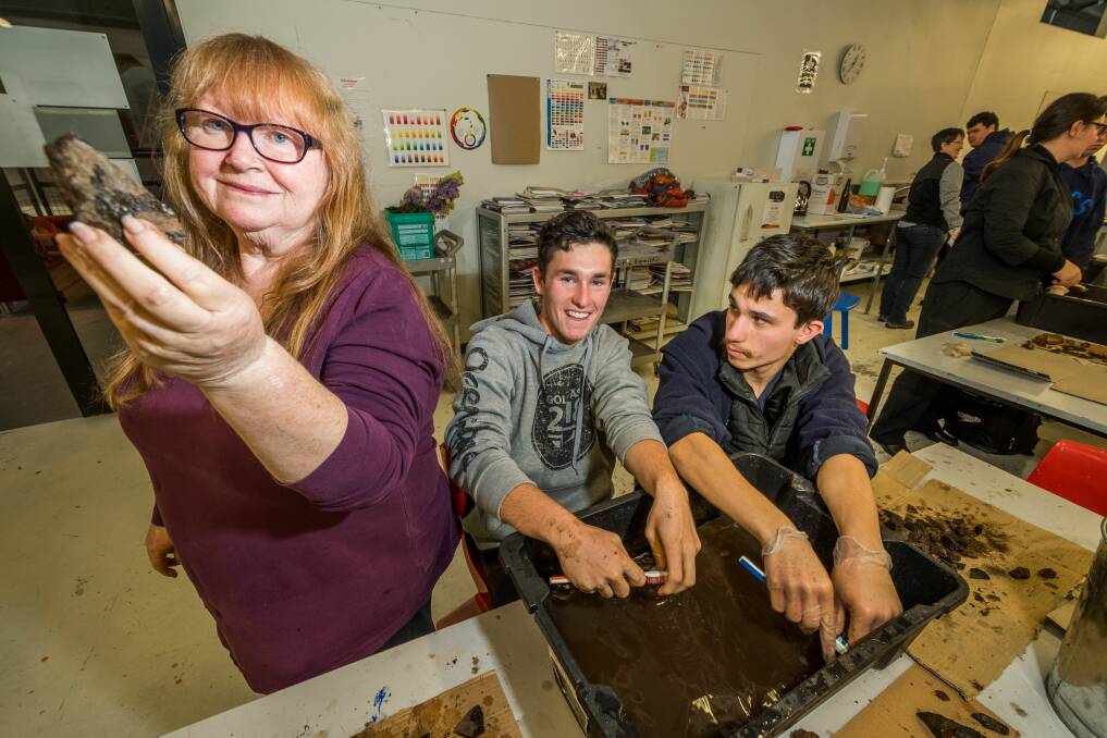 Archaeologist volunteers Lynette Ross, Jack Harvey and Julian Pavy. Pictures: Phillip Biggs 