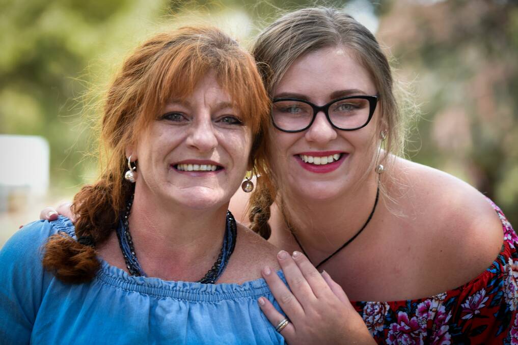 STRONG: Stage three melanoma survivor Lizzie May, of Kings Meadows, with daughter Angie Durrant, 19, who will lead this year's Melanoma March in Launceston. Picture: Paul Scambler 