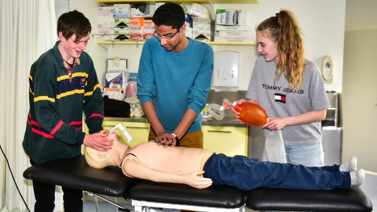 Hands on: UTAS medical students Sebastian Pilkington, Ahmed Awad and Lauren Gilmour, who wrapped up their Rural Week experience on Friday. Pictures: Neil Richardson
