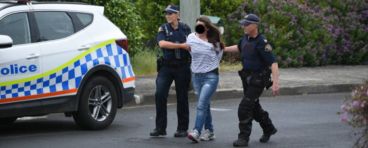 A 40-year-old woman was rescued from the house about 9.45am and taken into custody, along with a 24-year-old man. 