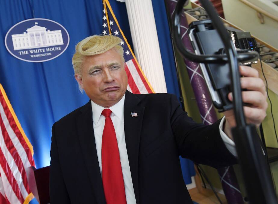Comedian John Di Domenico records a video as US President Donald Trump for the Cameo personalised messaging service. Picture: Getty Images