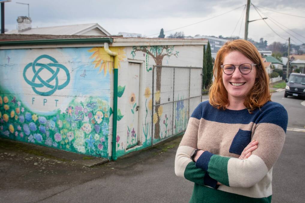 Family Planning Launceston lead doctor Rose Tilsley, with the mural she helped paint when she was a student. Pictures: Paul Scambler 
