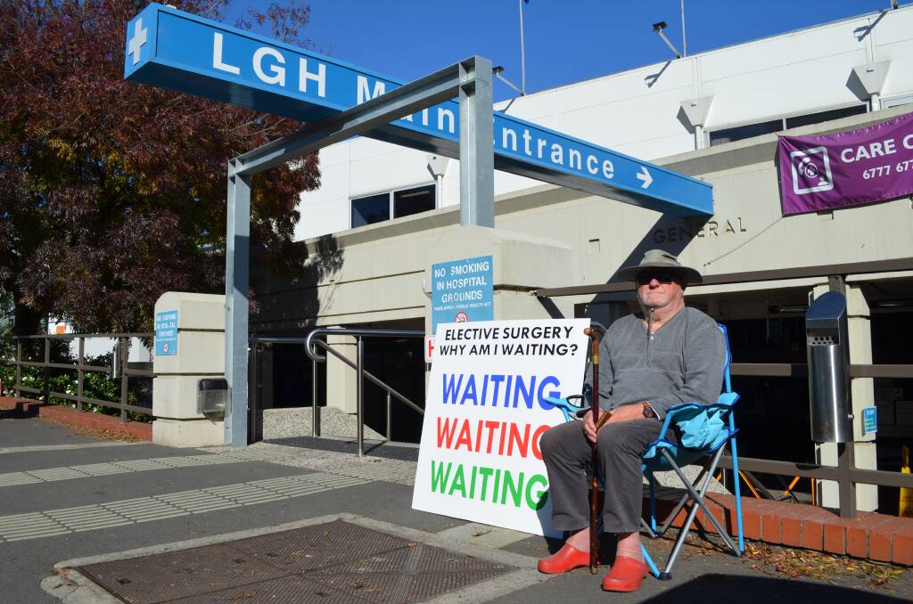 MESSAGE: Michael Murrell, 79, is among more than 51,000 Tasmanians waiting for an outpatient appointment. In need of a hip replacement, on Tuesday he took his concerns directly to Launceston General Hospital. Picture: Jessica Willard 