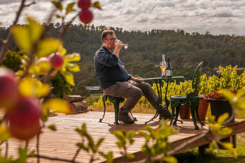 Domescapes in the Vines partner Adam Hirst enjoys drop on the deck at Swinging Gate Vineyard. 