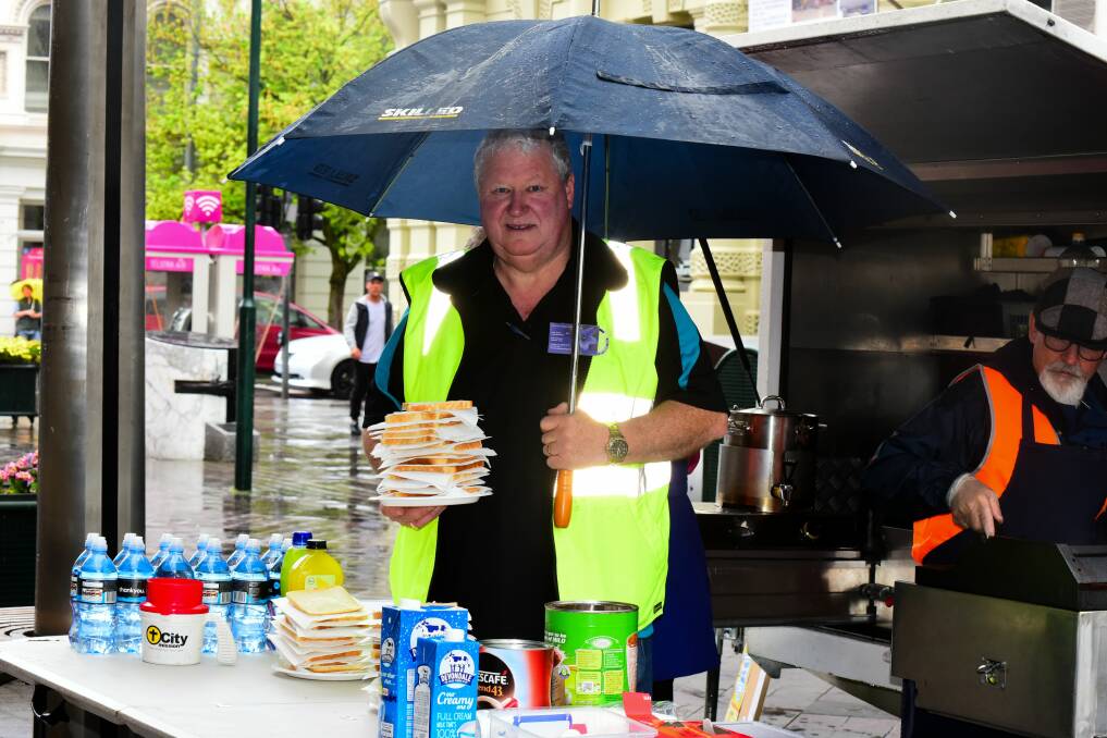 John Stuart, pictured in 2017 helping to feed the homeless as part of Poverty Week. Picture: Neil Richardson 