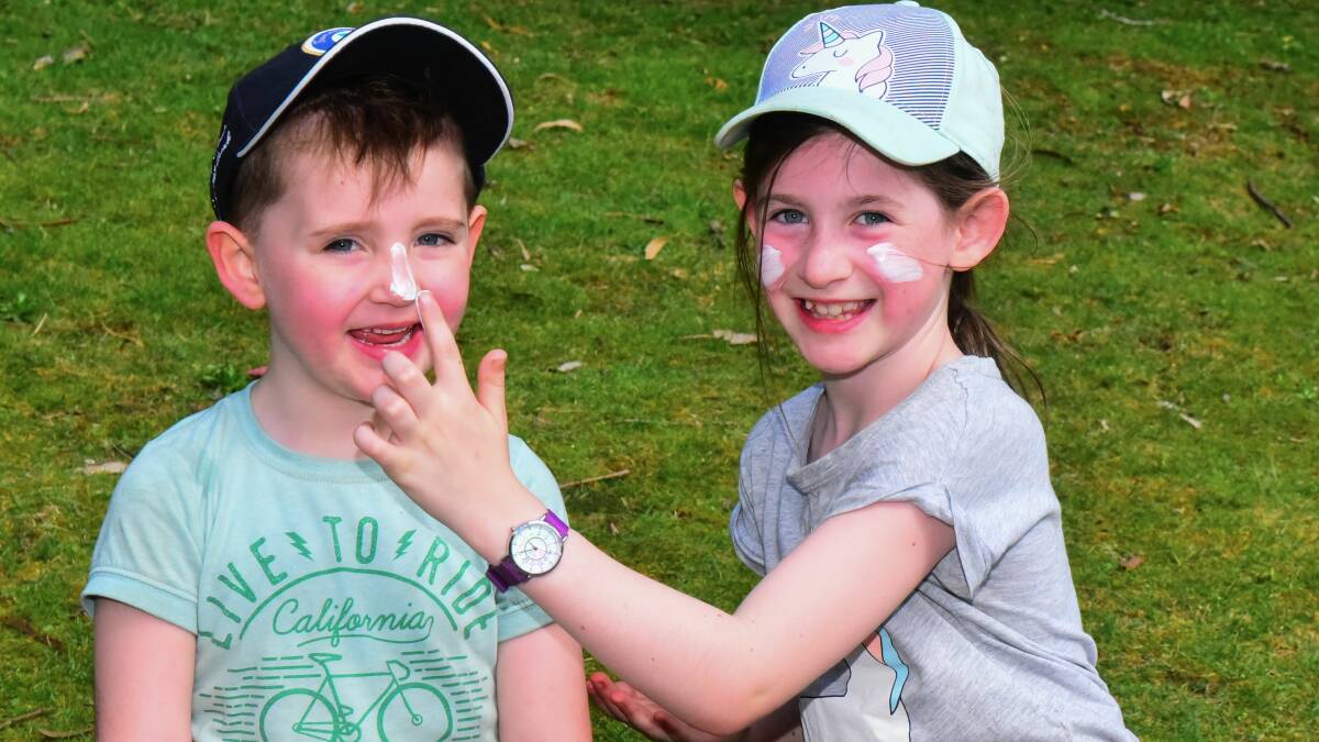 SLIP SLOP SLAP: Five-year-old Oliver Fairbairn of Launceston, has a sun safe day at the Gorge with sister Isabella, 8. Picture: Neil Richardson  