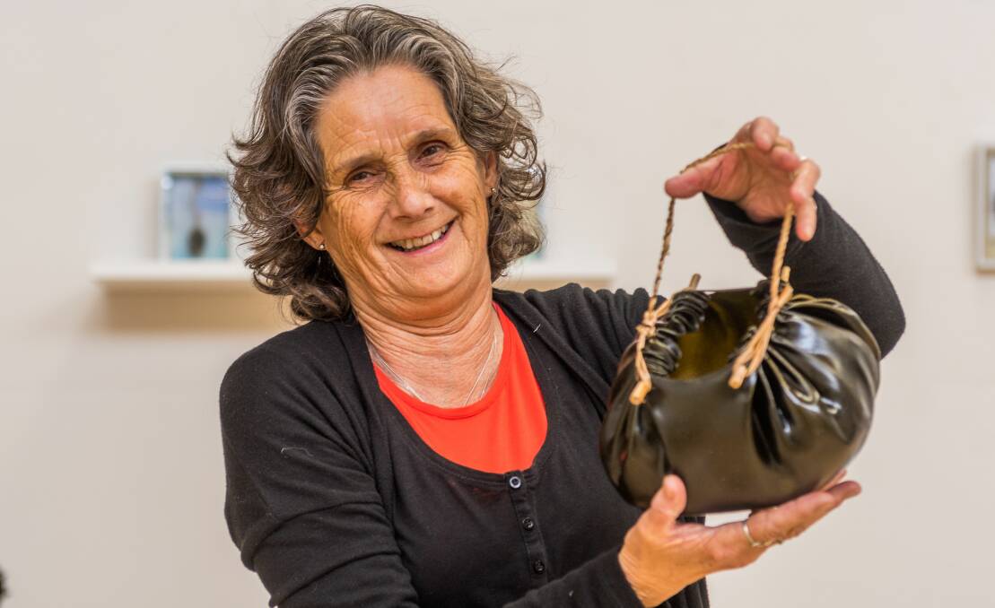 PASSION: Aboriginal artist and Elder Nannette Shaw, with one of her kelp sculptures.  