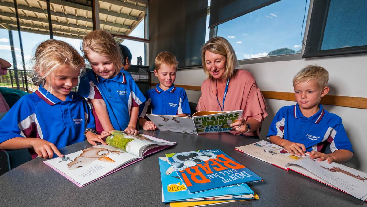 LEARNING: Punchbowl principal Elizabeth O'Donahue with students Charlotte Weks, Ivy Mabin, Tayte Seen and Harry Taylor. Picture: Phillip Biggs