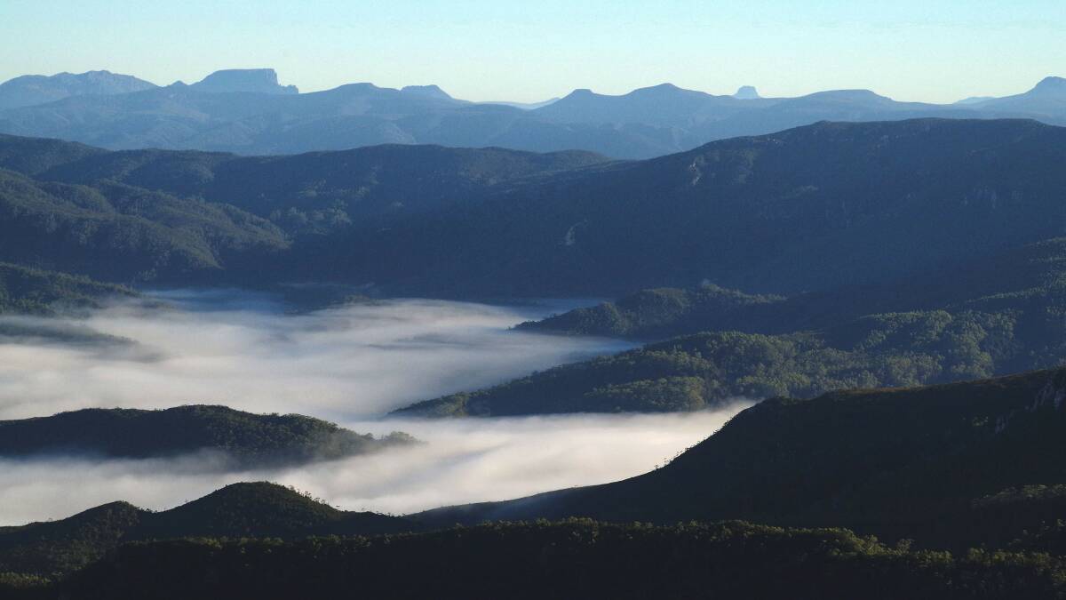 Fog nestled in the valleys, looking towards Eldon Bluff. Photo taken from near Lake Tahune.