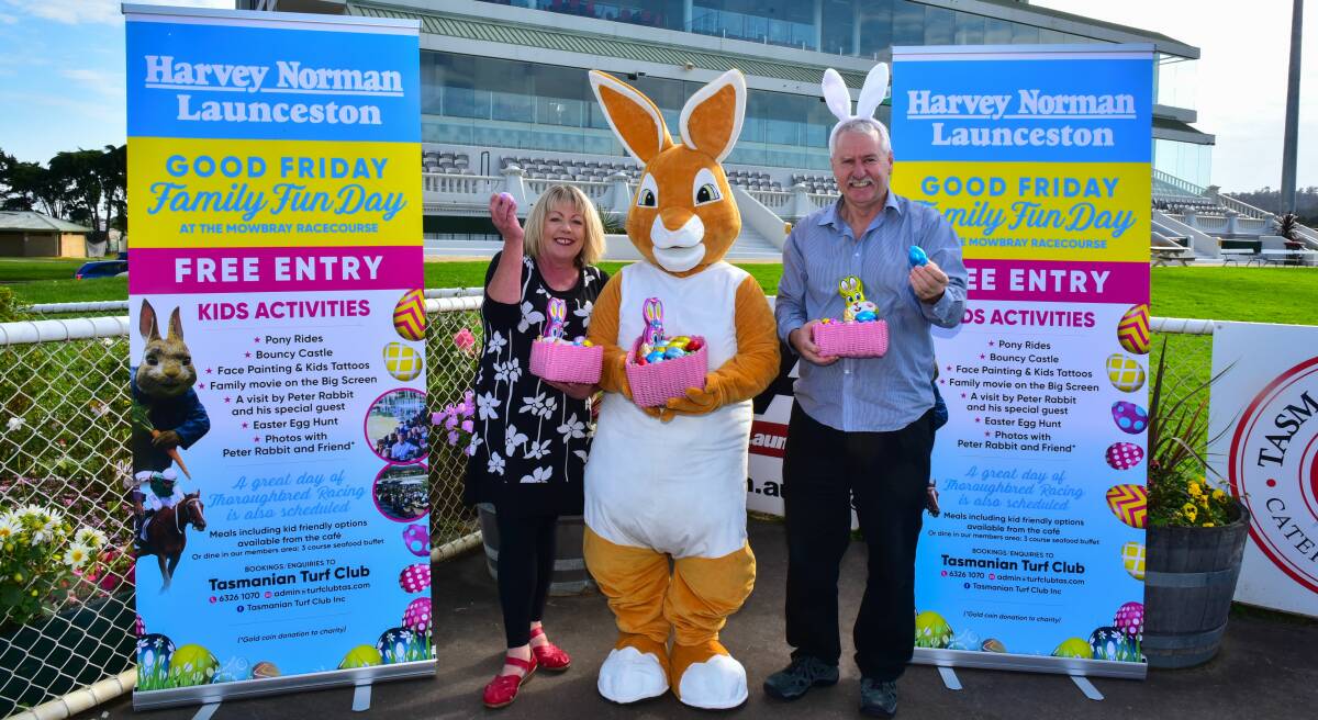 Event: Peter Rabbit joins Kathy Hill and Tasmanian Turf Club chief executive Peter Scott, ahead of Friday's family fun day. Picture: Neil Richardson 