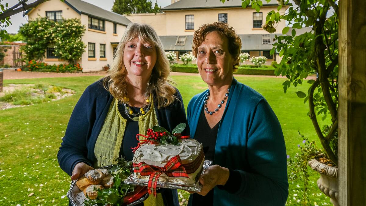 SWEET: Franklin House volunteer Sue Harrison and Franklin House Committee Chairperson Julie Dineen, with some of the fruit mince pies and Christmas cake to be served at Sunday's carols. Picture: Phillip Biggs. 