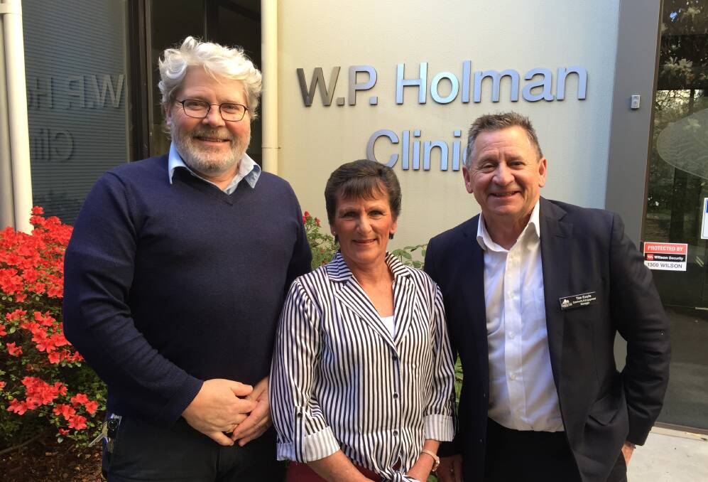 WP Holman Clinic nurse unit supervisor Andy Brown, with Erica Buller and Country Club Tasmania's community engagement manager Tim Coyle. Picture: Jessica Willard 