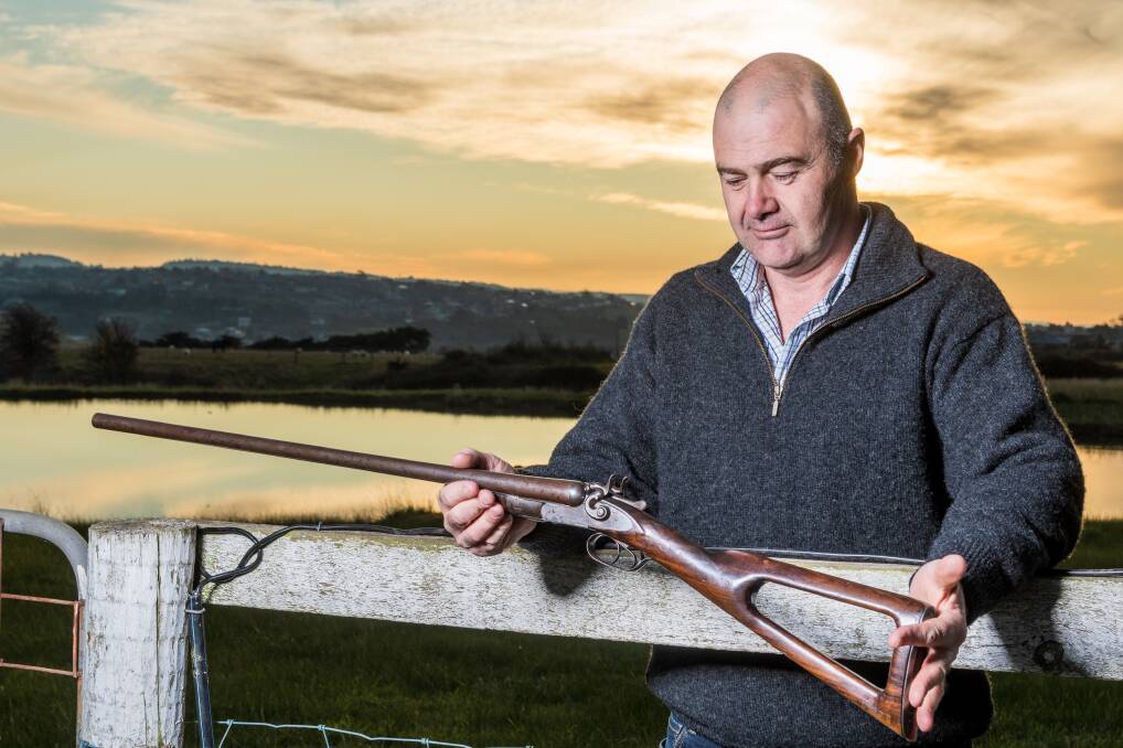 HEIRLOOM: Peter Thurley passed the 150-year-old shot gun to his son, Dean Thurley, when he died about six years ago. Picture: Phillip Biggs