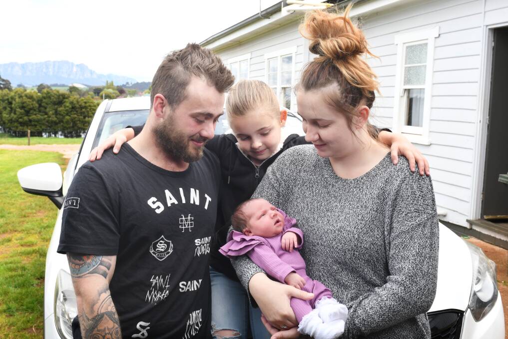 WELCOME ARMS: Barrington's Jaydan Wall, Emma Garwood and 6-year-old Nevaeh have welcomed baby Amiyah to the family. Picture: Brodie Weeding
