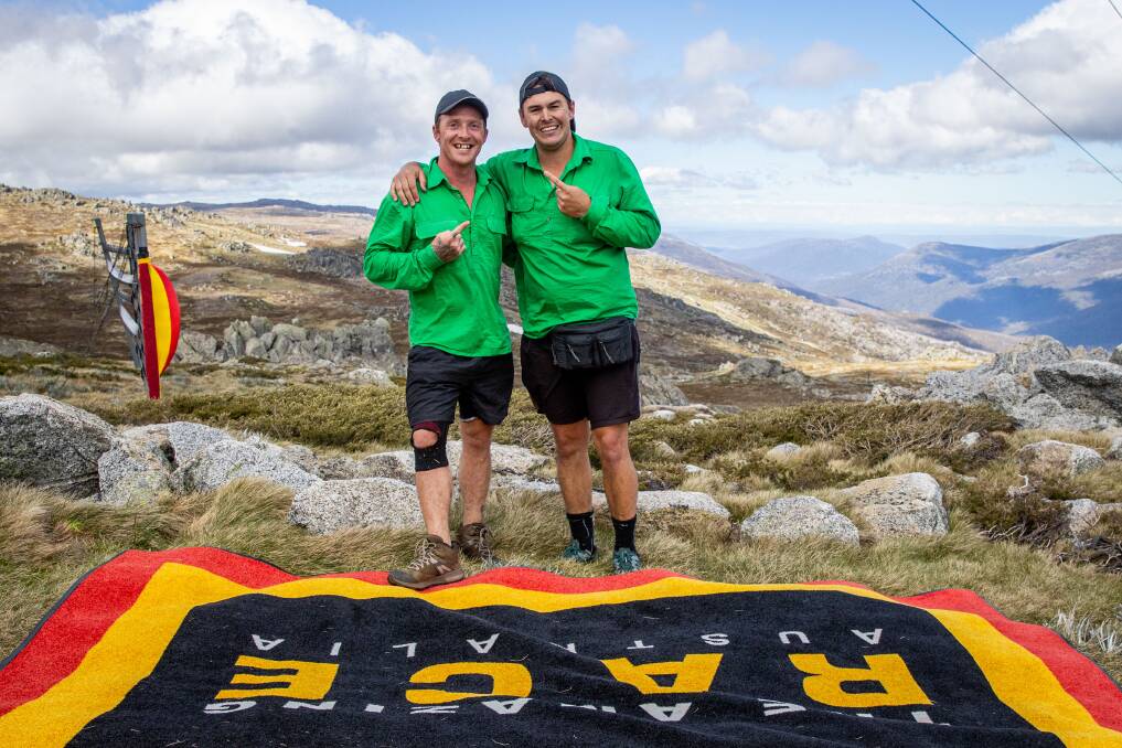 WINNER WINNER: Brendon and Jackson at the top of Mount Kosciuszko, after winning the Amazing Race Australia and the $250,000 cash prize. Photo: supplied