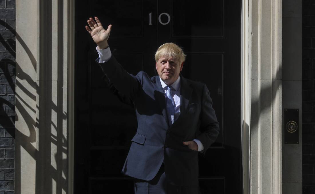 A mini Trump?: New UK Prime Minister Boris Johnson enters number 10 Downing Street in London on Wednesday. Just how he will deal with a string of challenges, including Brexit, the economy and Iran, remains to be seen. Photo: Simon Dawson