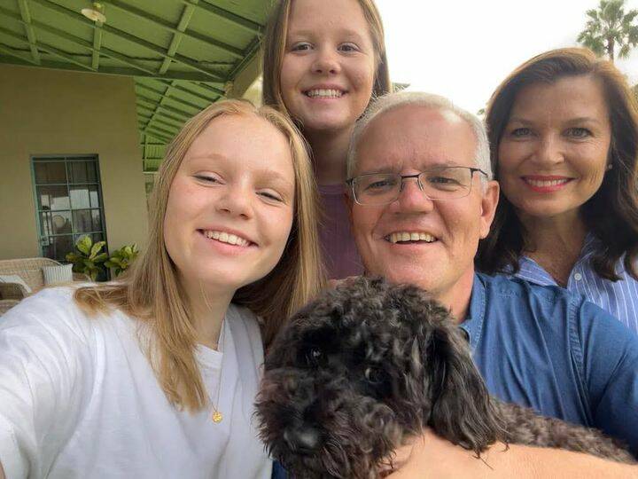 Scott and Jenny Morrison with their daughters Abbey and Lily and dog Buddy. Picture: facebook