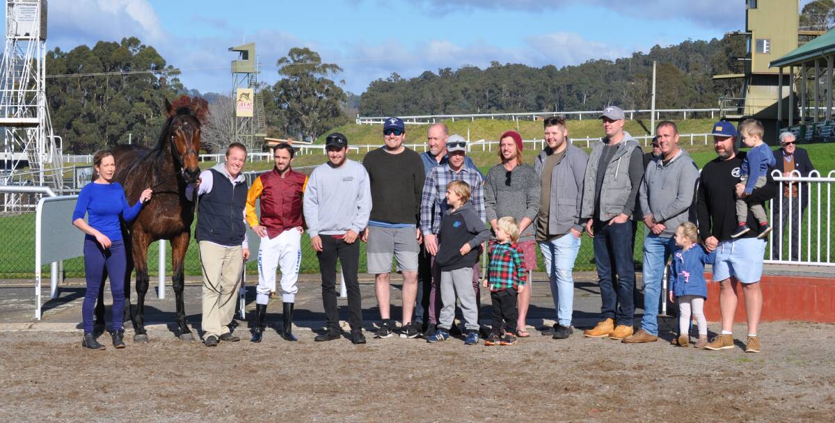 HIGH ASPIRATIONS: Aspirate with trainer Rowan Hamer and other connections after winning at Spreyton in July. The gelding will tackle the $100,000 Launceston Guineas at Mowbray on Wednesday night. Picture: Greg Mansfield 