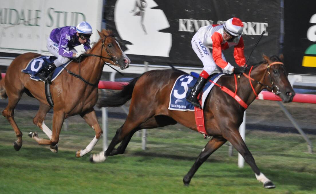 MYSTICAL WIN: Mystical Pursuit, ridden by Chris Graham, leaves hot favourite Deroche in her wake as she wins the Alfa Bowl at Mowbray on Wednesday night. Picture: Greg Mansfield