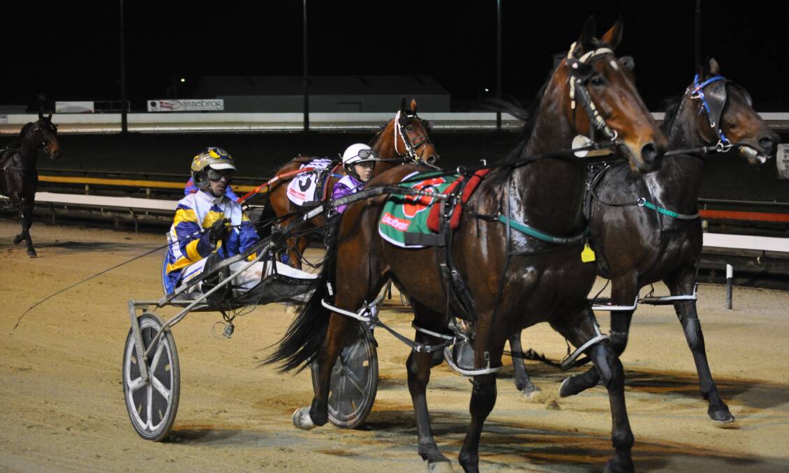 Troy McDonald, a runaway leader on the drivers' premiership, warms up Somedan for a race at Devonport.