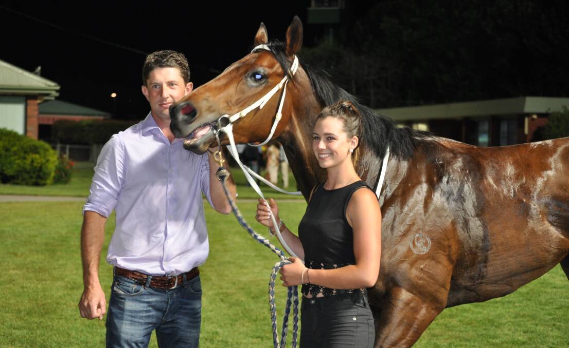 NEW RIDER: Gee Gees Jet with trainer Stuart Gandy and strapper Tayla Patterson after a win at Mowbray. The sprinter will be ridden by Tasmania's newest apprentice Amirul Ismadi in the Newmarket Handicap.