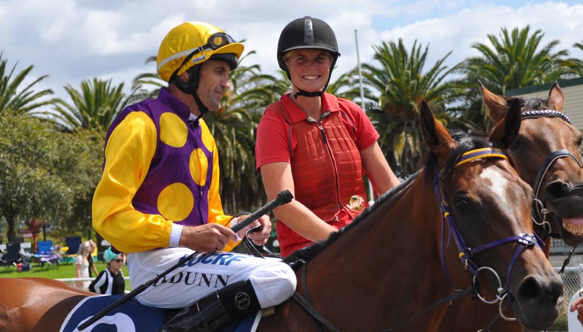 MULTI SKILLED: Clerk of the course and successful trainer Sarah Cotton with Victorian jockey Dwayne Dunn at Mowbray. Picture: Greg Mansfield