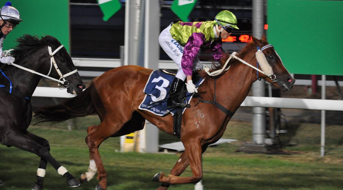 GONE HOME: Simon Kok wins on Gee Gees Liberty at Mowbray in January. The apprentice broke his ankle on Launceston Cup day and has returned to Singapore. Picture: Greg Mansfield