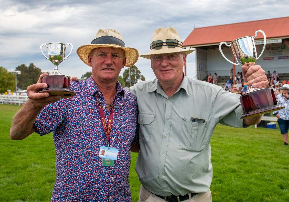 Trainer John Blacker and part-owner Rob French with their Longford Cup trophies ... Super Swoop will now target the Launceston Cup.
