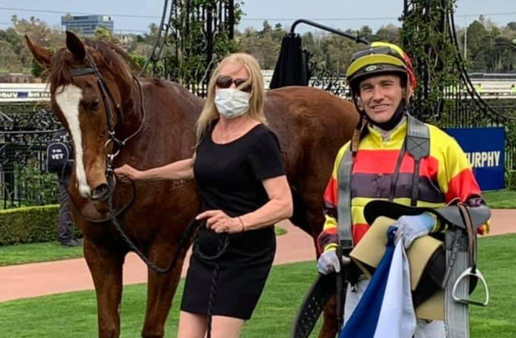 RETURN: Strapper Monica Ryan and jockey Luke Currie with Still A Star after she and Mystic Journey were both placed at Flemington on Saturday.