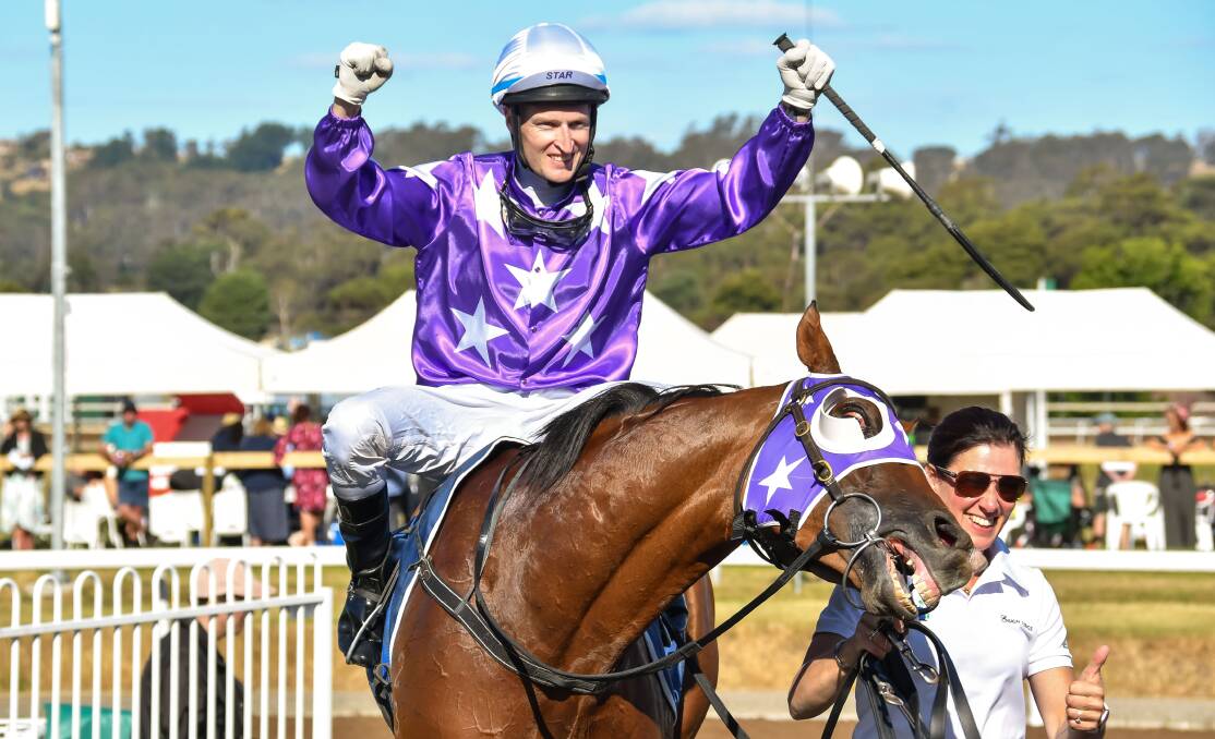 TOO GOOD: Elated jockey Craig Newitt and strapper Tania Coward with Eastender. Picture: Simon Sturzaker