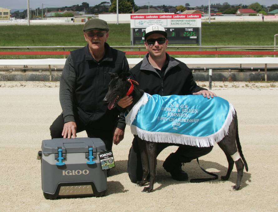 Owner Tom Englund and owner-trainer Ben Englund with Wynburn Sheean after his Puppy Championship win.