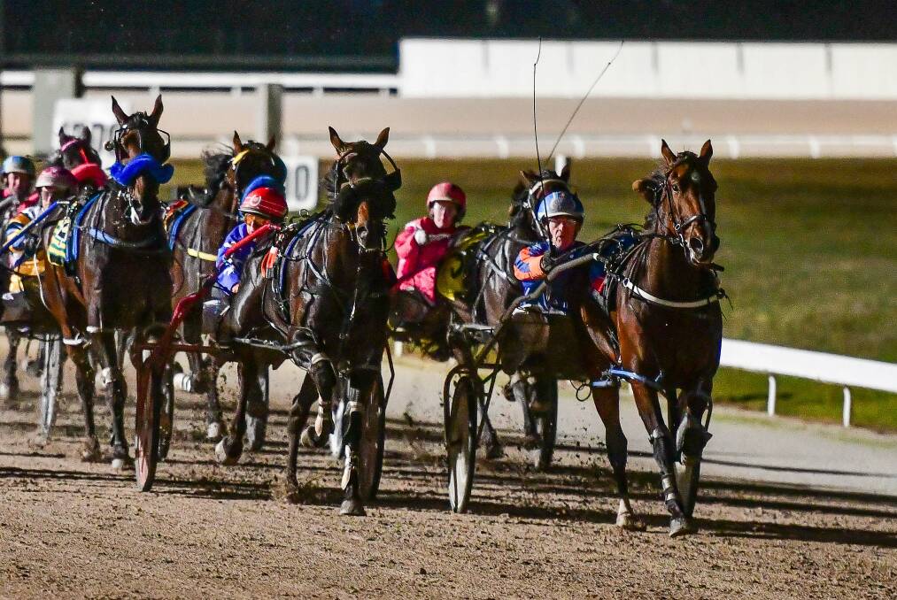 WIN No. 5: Gavin Lang heads for home on Franco Tristan in the closing stages of the $75,000 Dakin Refrigeration Easter Cup final at Mowbray on Saturday night. Picture: Scott Gelston.