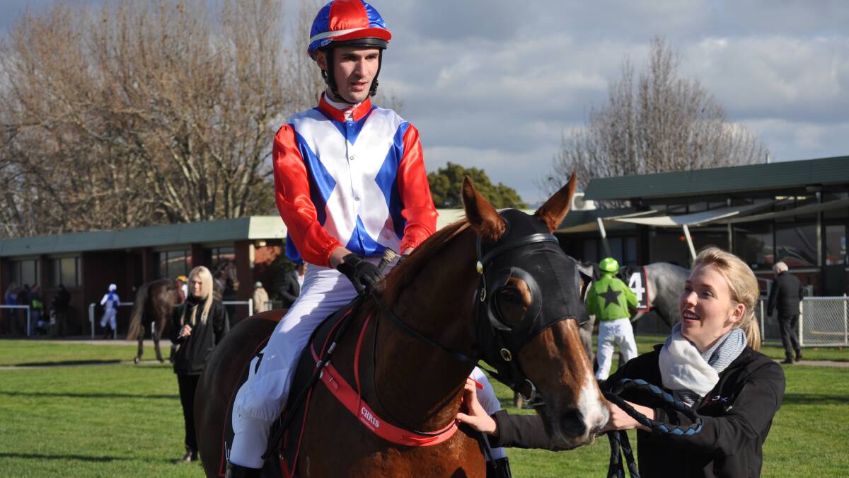 OUT OF LUCK: Apprentice Chris Graham with Egalitarian and strapper Laura Blacker after a recent win at Mowbray. Graham has been sidelined by an untimely suspension. Picture: Greg Mansfield