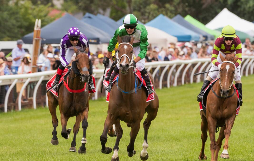 HOME TOWN TRIUMPH: Local mare Triple Strip (centre) wins the 2020 Longford Cup. Her trainer John Blacker has topweight Glass Warrior in this year's race which has had an increase in prizemoney.