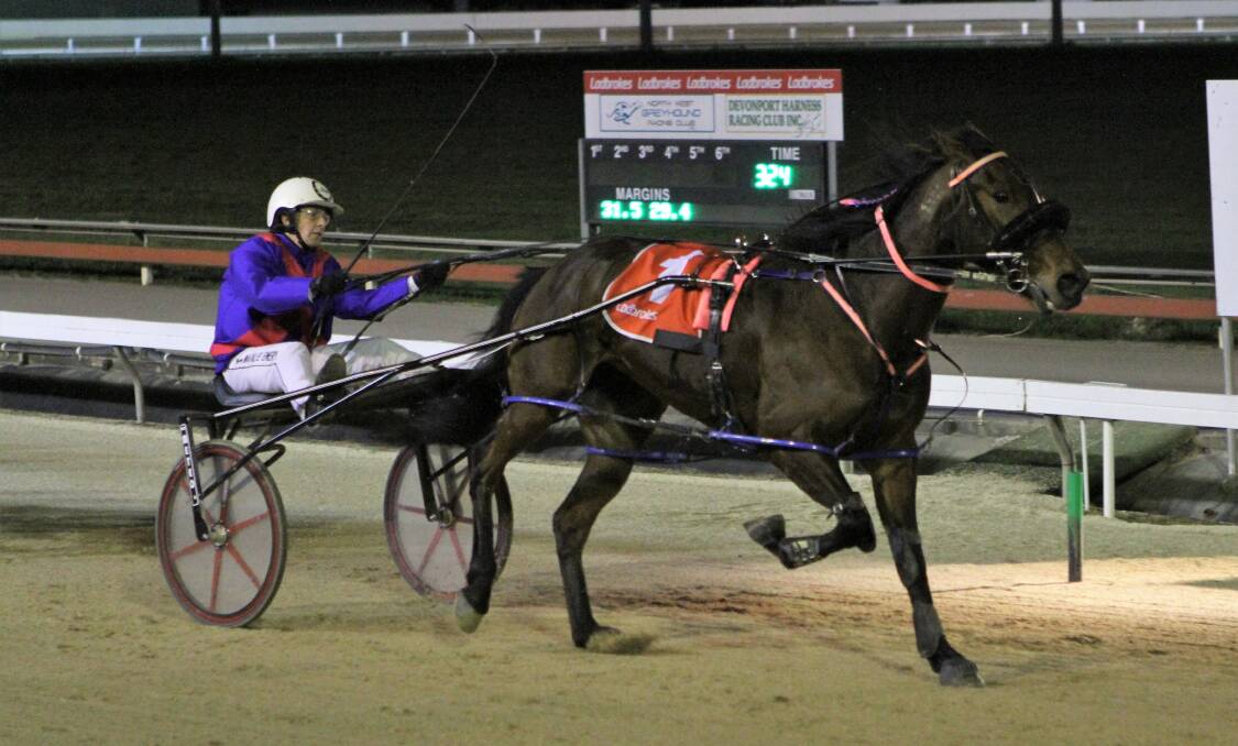 TOO GOOD: Blame It On Me, driven by Natalee Emery, cruises home in the Granny Smith final in Devonport on Sunday night. Picture: Brad Cole