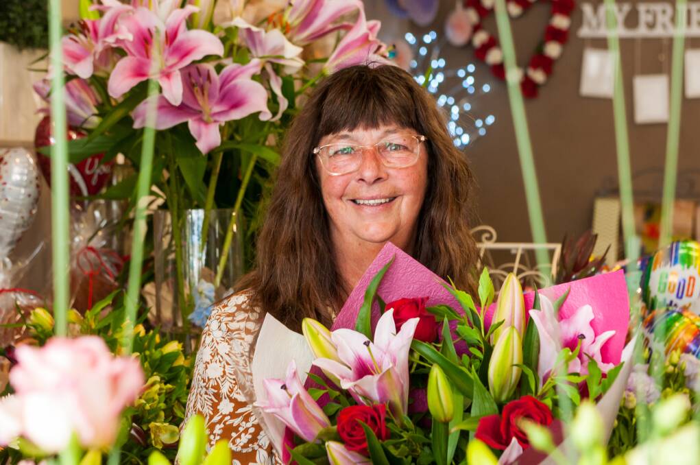 Liz Flaherty has run/owned the Kings Meadows Florist for 30 years. Picture: Phillip Biggs 
