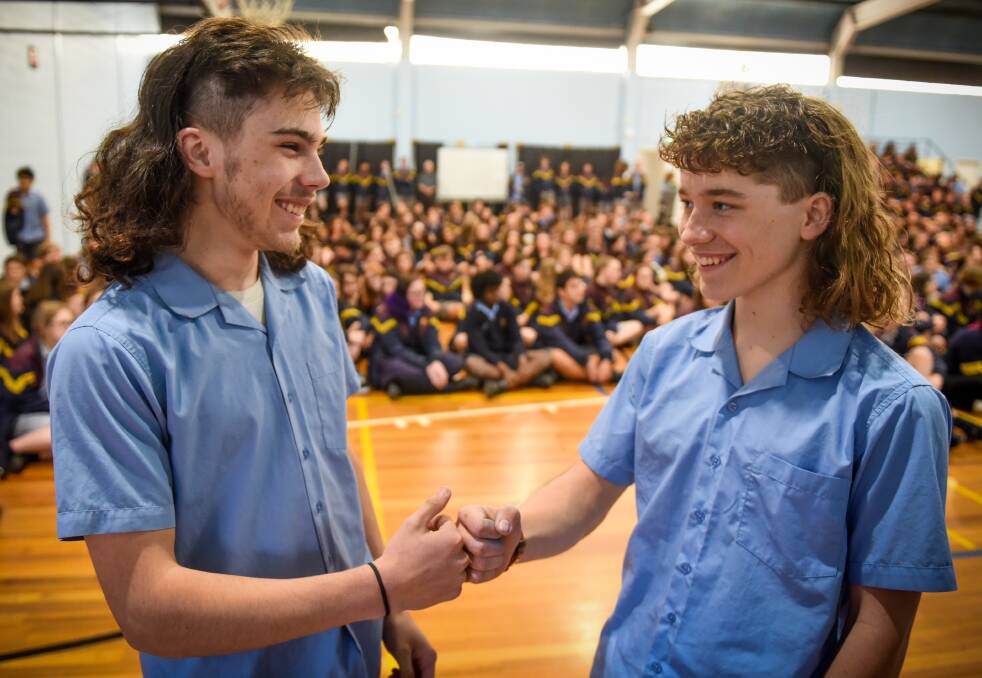 Grade 10 students Jesse Egan and Max Jordan with their new mullet haircut for Mental Health fundraiser. Picture: Paul Scambler. 