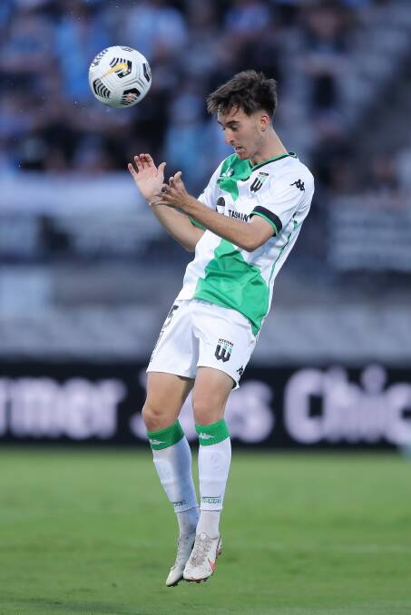 United's Luke Duzel heads the ball during the A-League match against Sydney FC on March 10. Picture: WUFC