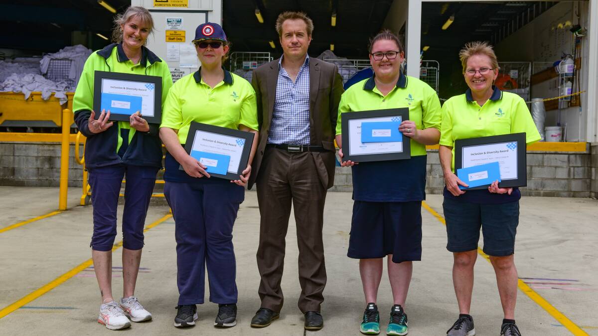 CEO of Blueline Laundry Michael Sylvester with the team awarded the Inclusion and Diversity award - Charmaine Ackroyd, Samantha Lauder, Breanna Green, and Cheryl Edwards. Picture: Paul Scambler