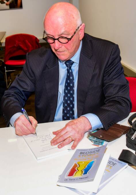 Book signing with Dr Hannan. His next book is on the way. Picture: Neil Richardson