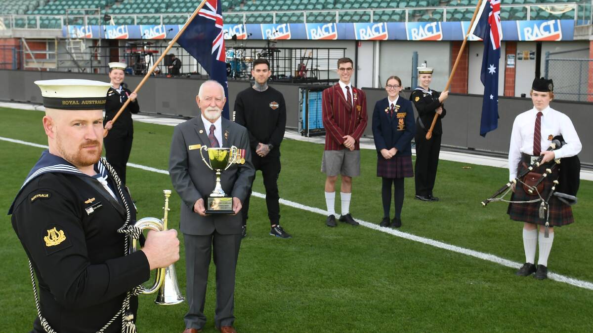 Royal Australian Navy Band bugler Dorian Broomhall, with RSL Tasmania vice president Geoff Leitch, the navy's Laura Nichols and Nikayla Taskinen-Smith and Matthew Garwood, with Scotch Oakburn College's Jack Oates Pryor, Lucy Chesterman and Joseph Clyde. Picture: Paul Scambler