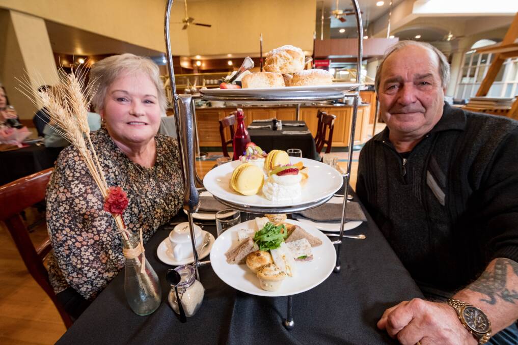 TASTY: Damien and Teena Giustini, of Westbury, enjoy a high tea at Avenue Restaurant as part of the NORTH Festival. Picture: Phillip Biggs