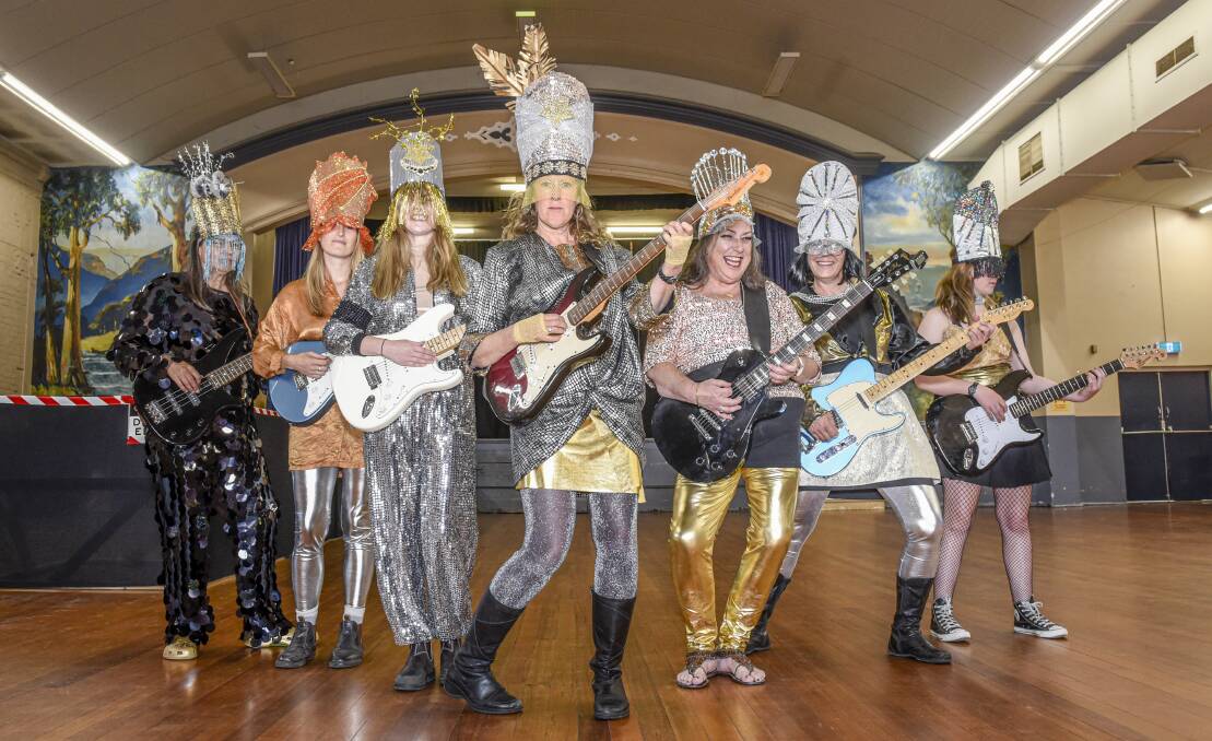 Some of the members of the all girl guitar rock band Mapatazi, Karlin Love, Frankie Andrew, Caitlin Wilson, Rose Ertler, Jane Allan, Pip Stanley and Cleopatra. Picture: Craig George 