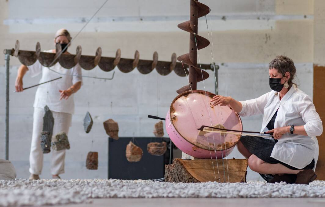 Performers play at Megan Cope's Untitled (Death Song). Pictures: Phillip Biggs