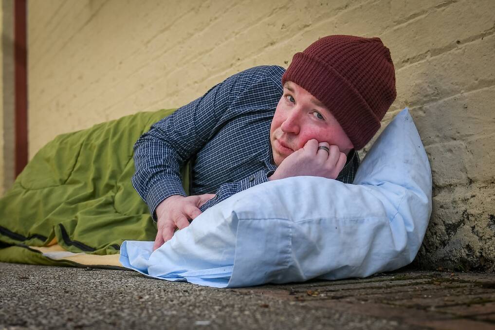 Hays recruitment General manager James Ower tries his sleeping bag out in preparation for the Vinnies CEO sleepout. Picture: Paul Scambler 